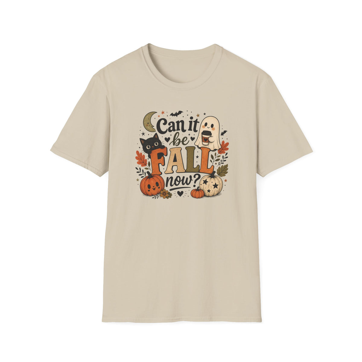 A light beige crewneck t-shirt featuring a colorful graphic print on the front with the text 'Can it be FALL now?' surrounded by autumn and Halloween elements like pumpkins, a ghost, a cat, and leaves.