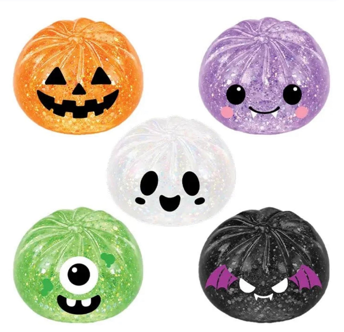 Five round, pumpkin-shaped glittery stress balls with cute cartoon faces, shown in orange jack-o'-lantern, purple smiling face, white ghost, green one-eye monster, and black vampire designs on a white background.
