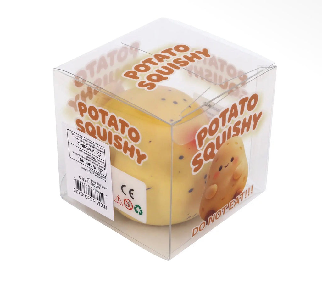 A potato-shaped squishy toy inside a clear plastic cube box with 'POTATO SQUISHY' printed on the packaging, shown on a white background.