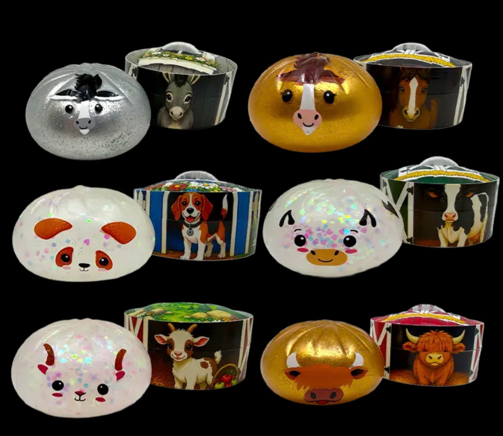 A set of 12 small decorative ornaments shaped like farm animals, arranged in a 3x4 grid against a solid black background. The ornaments include silver, gold, white, brown, and black colors, with some featuring a glittery/iridescent finish.
