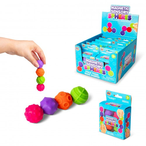 Colorful magnetic sensory spheres with packaging on a white background