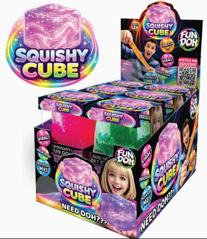 A retail display box filled with colorful Squishy Cube toys, alongside a large promotional graphic of a pink and purple marbled cube on a rainbow background. The packaging features cartoon characters and text like 'Squishy Cube', 'Dough Fun!', and 'Need Doh???'.