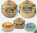 Five packaged toy products from Cosy Fun are arranged on a light gray background. The products include two large round mystery bun packages labeled 'The Vital Mystery Bao Bun' and 'RAINBOW ?MYSTERY? BAO BUN', one smaller round package, one beige bun-shaped toy, and one round blue accessory showing colorful button icons.