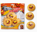 Pack of 'Sticky Bubble Bubbies' waffle squish toys shown in its orange and yellow packaging alongside three individual waffle-shaped toys on a white background.