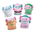 Five cute plush toys arranged on a white background, each with a different colorful design: a pale blue fluffy character, a pink Santa-style character, a green Christmas tree character, an orange character with pink spikes and a bow tie, and a pink character wearing a teal sweater that reads 'THIS IS MY COZY SWEATER'.