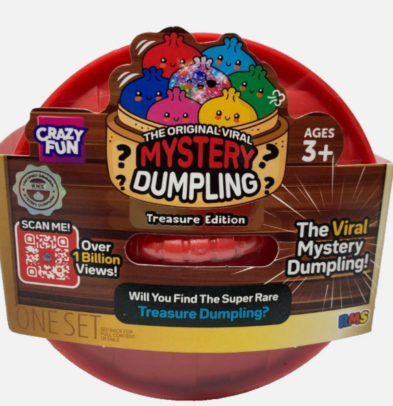A red round mystery dumpling package labeled 'The Original Viral Mystery Dumpling Treasure Edition' with colorful cartoon dumpling graphics and text including 'Crazy Fun' and 'Ages 3+'.