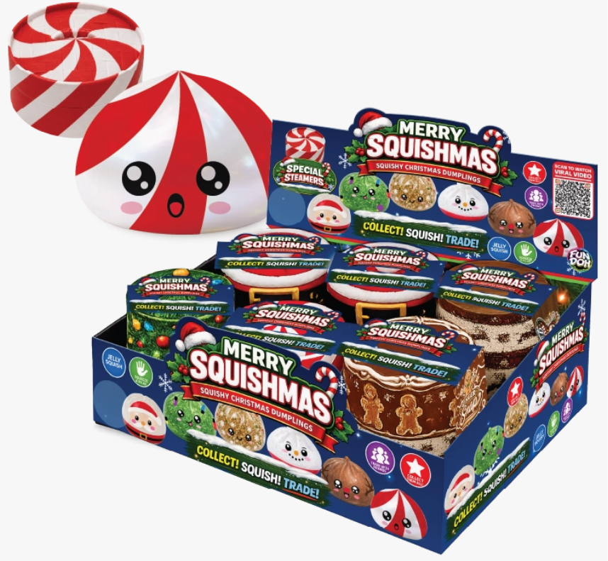 A retail display box of Merry Squishmas collectible squishy Christmas treats, featuring a large red-and-white striped round treat and a white round treat with a red face on a clean white background.