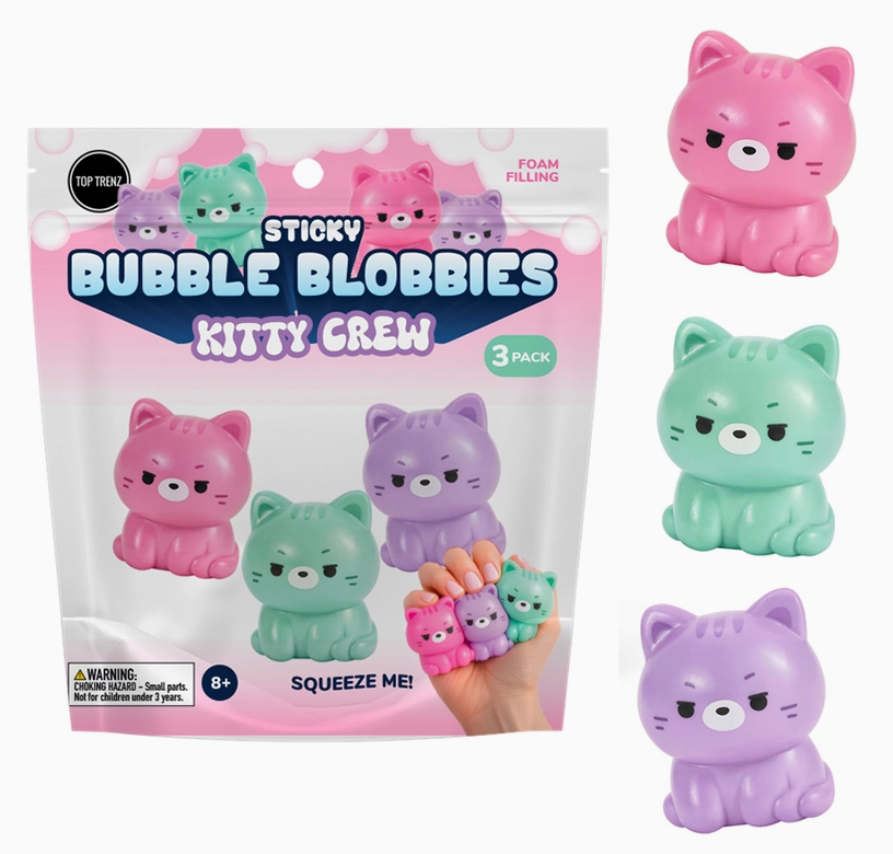 A 3-pack of Giff & Puff 'Sticky Bubble Blobbies' Kitty Crew foam figures, shown in its pink packaging alongside three individual cat figures in pink, mint green, and purple.