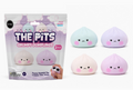 A 2-pack of 'The Pits Grumpy Dumplings' foam squeeze toys by Top Toys, shown in its packaging alongside four loose squishies in pastel shades of blue, purple, pink, and cream.