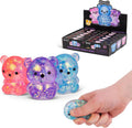 Colorful glittery bear toys with a hand holding one, displayed against a white background.