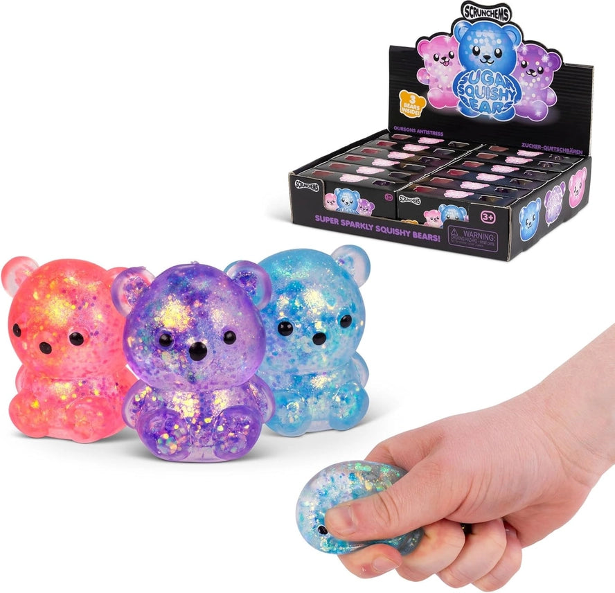 Colorful glittery bear toys with a hand holding one, displayed against a white background.
